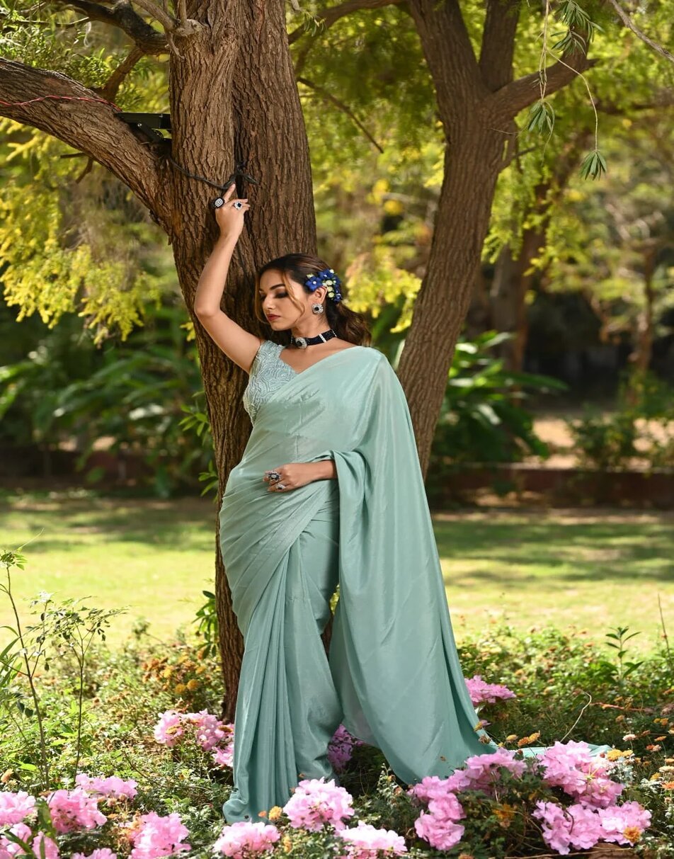 Aqua blue chinnon saree with hand embroidered blouse