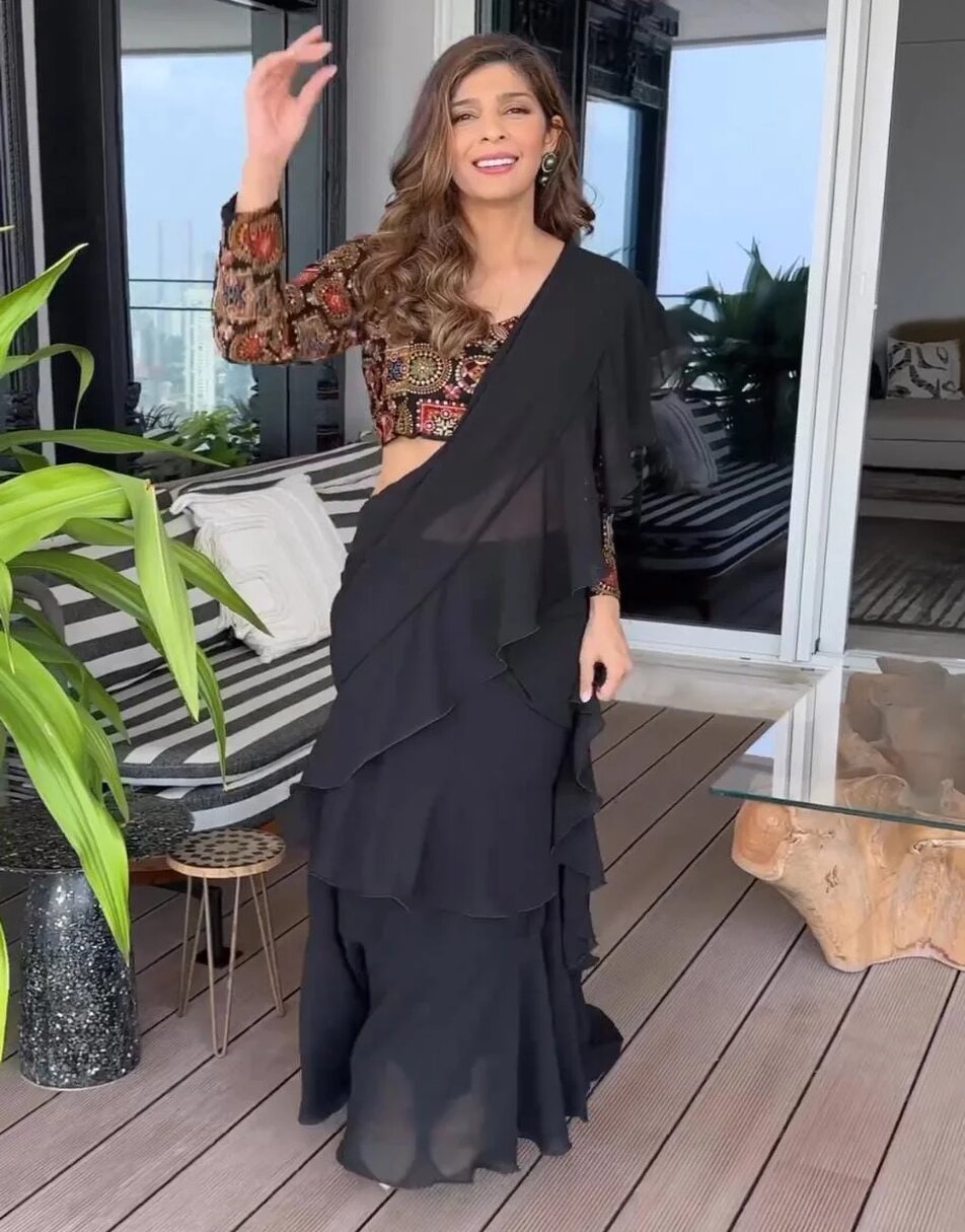 Black Ruffle Saree With Embroidered Blouse