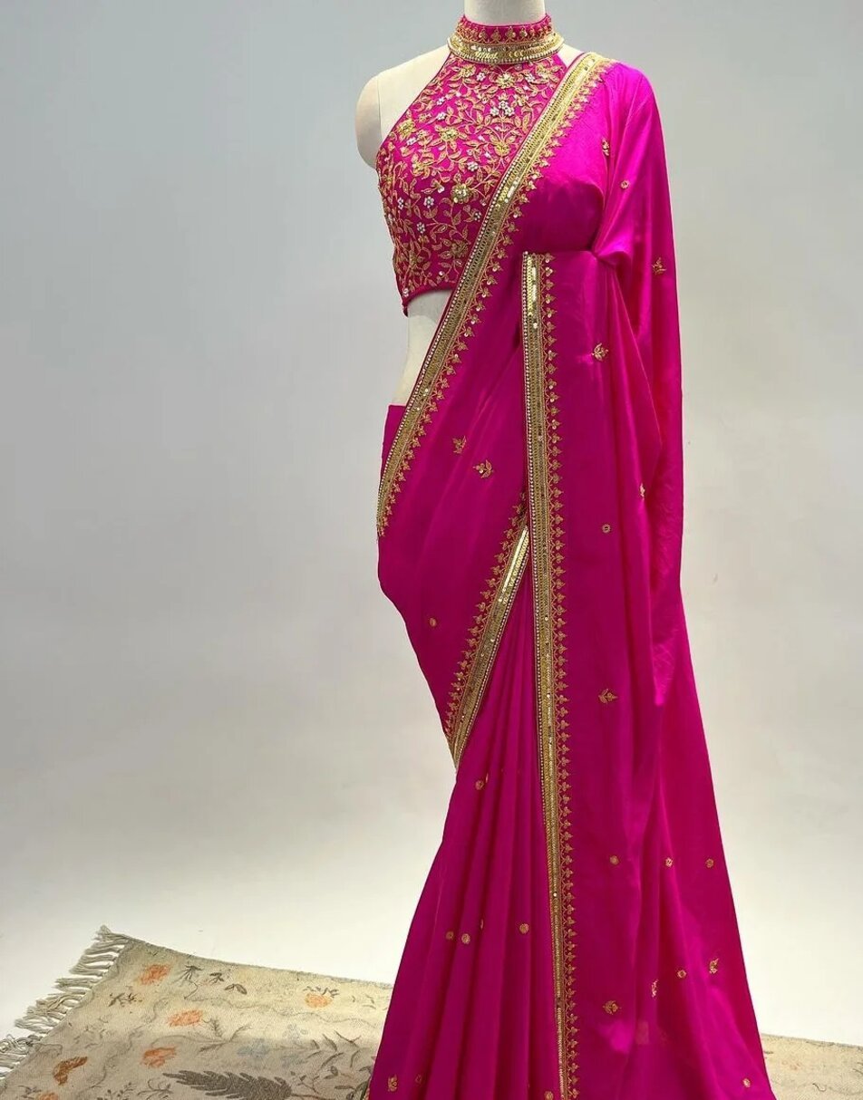 Rani pink silk saree with hand embroidered blouse