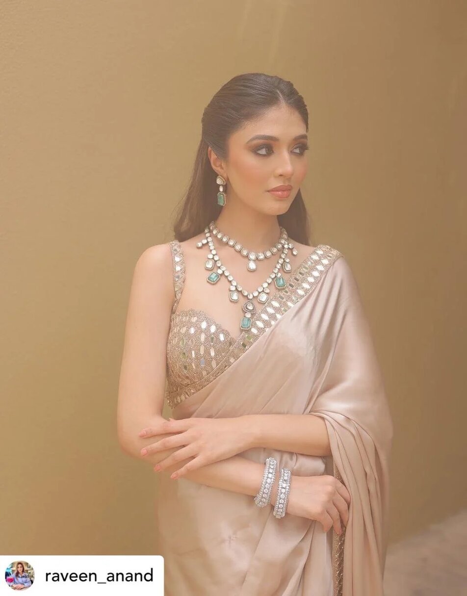 Beige modal satin saree with hand embroidered blouse