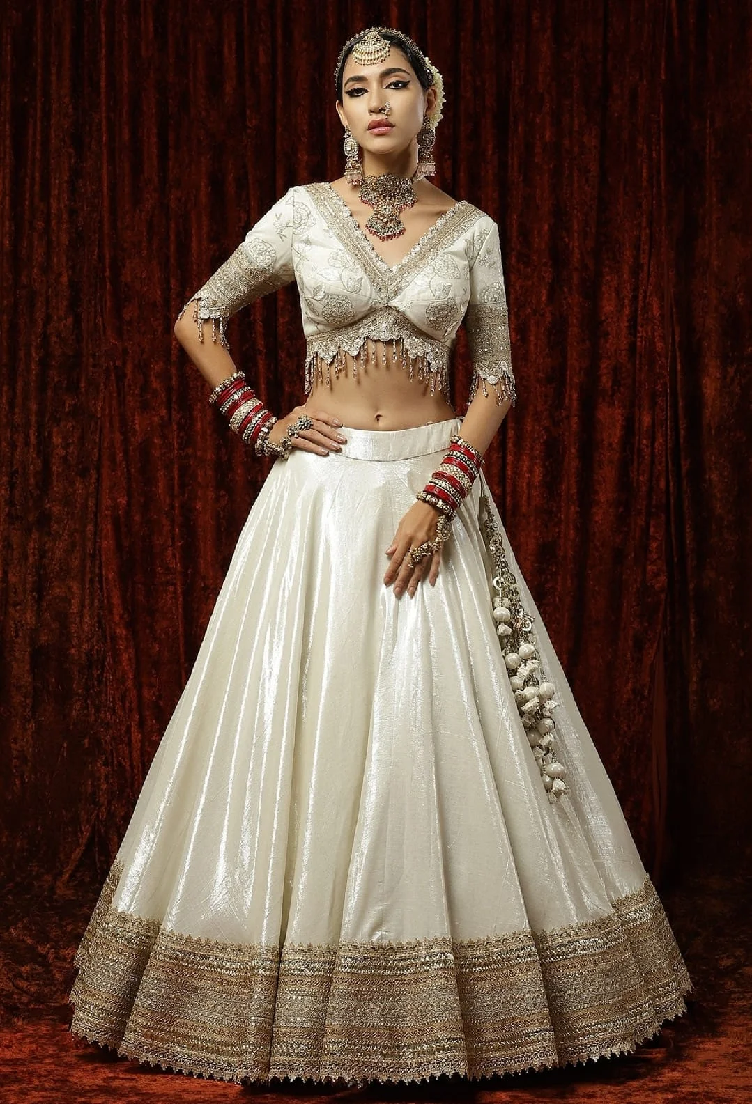 White tissue lehenga choli with heavy embroidery lace work