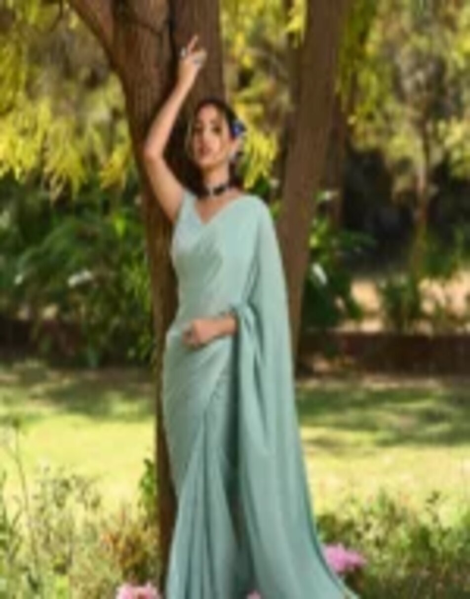 Aqua blue chinnon saree with hand embroidered blouse