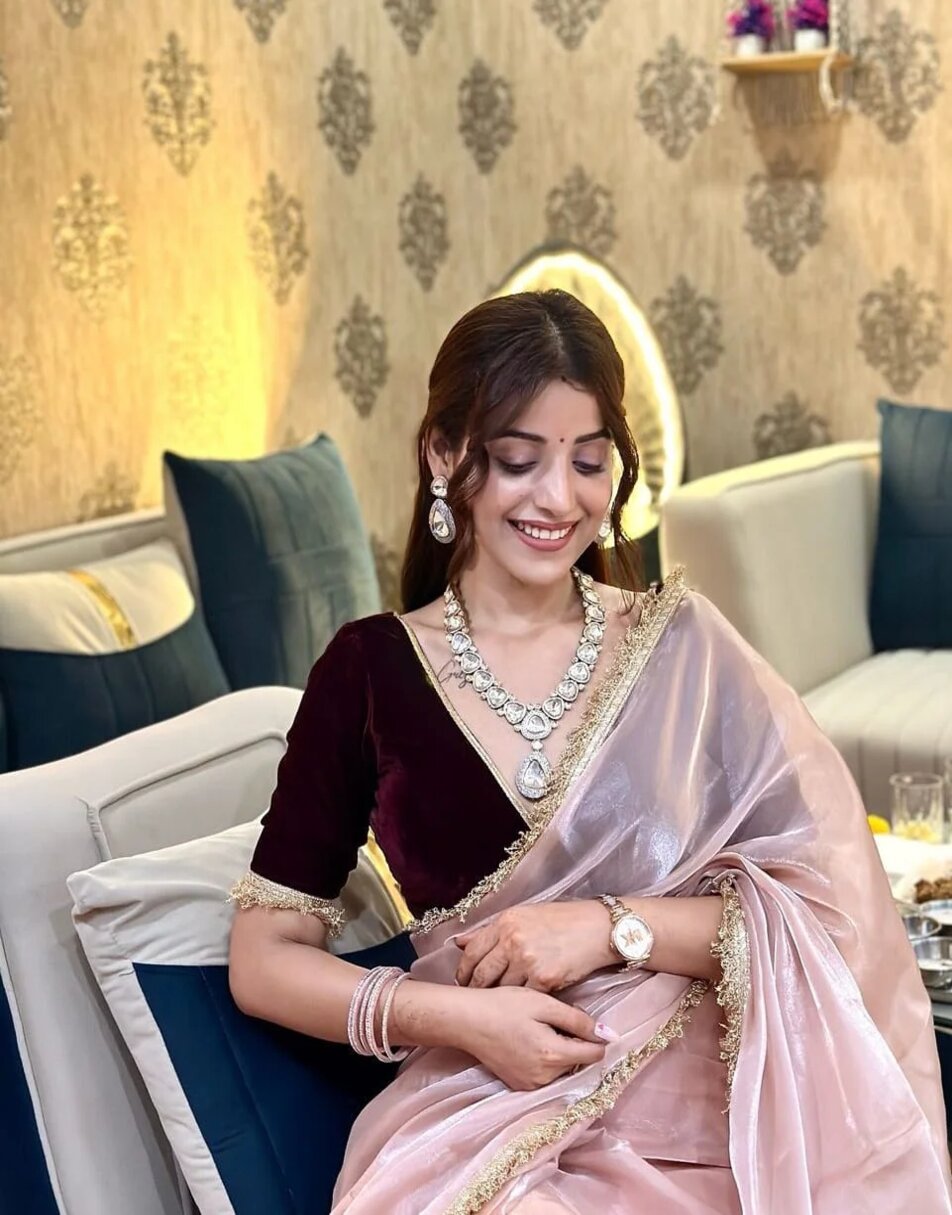 pink tissue saree with maroon velvet blouse