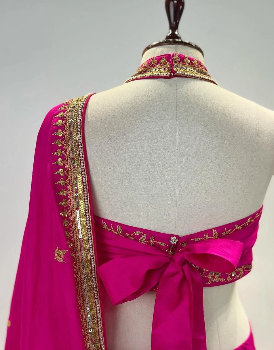 Rani pink silk saree with hand embroidered blouse