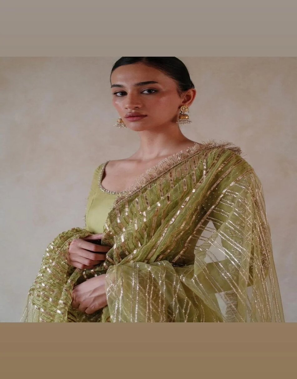 Green uppada silk anarkali with hand embroidered sleeves