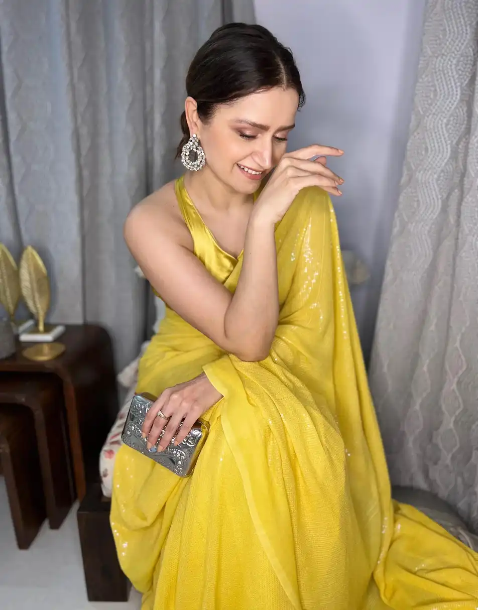 Mustard yellow sequin saree with satin blouse