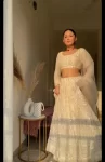 Off white luckwoni lehenga with embroidered blouse 4